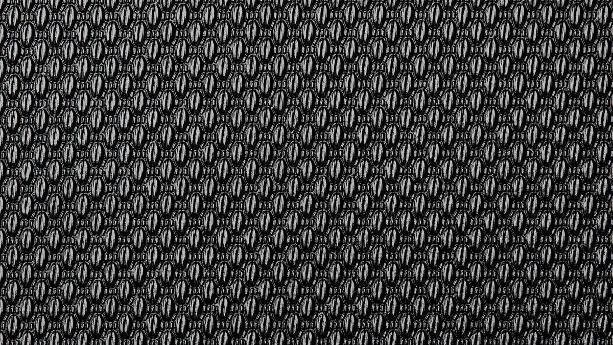 Close-up of a dark woven synthetic fabric, the tight weave a denier rating describes