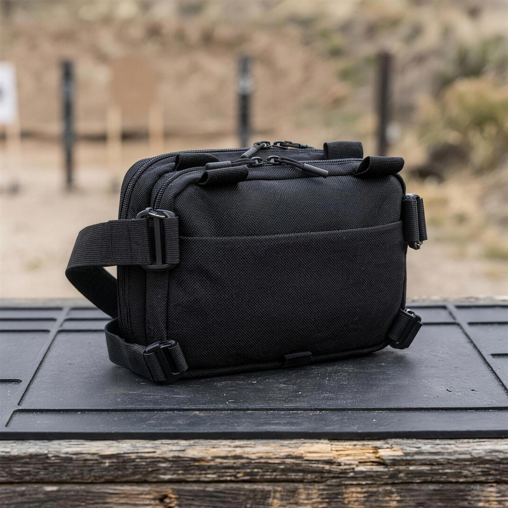 ICONTACTIC Expandable Concealment Carry Bag, concept render pending supplier verification, bag only on an outdoor range bench