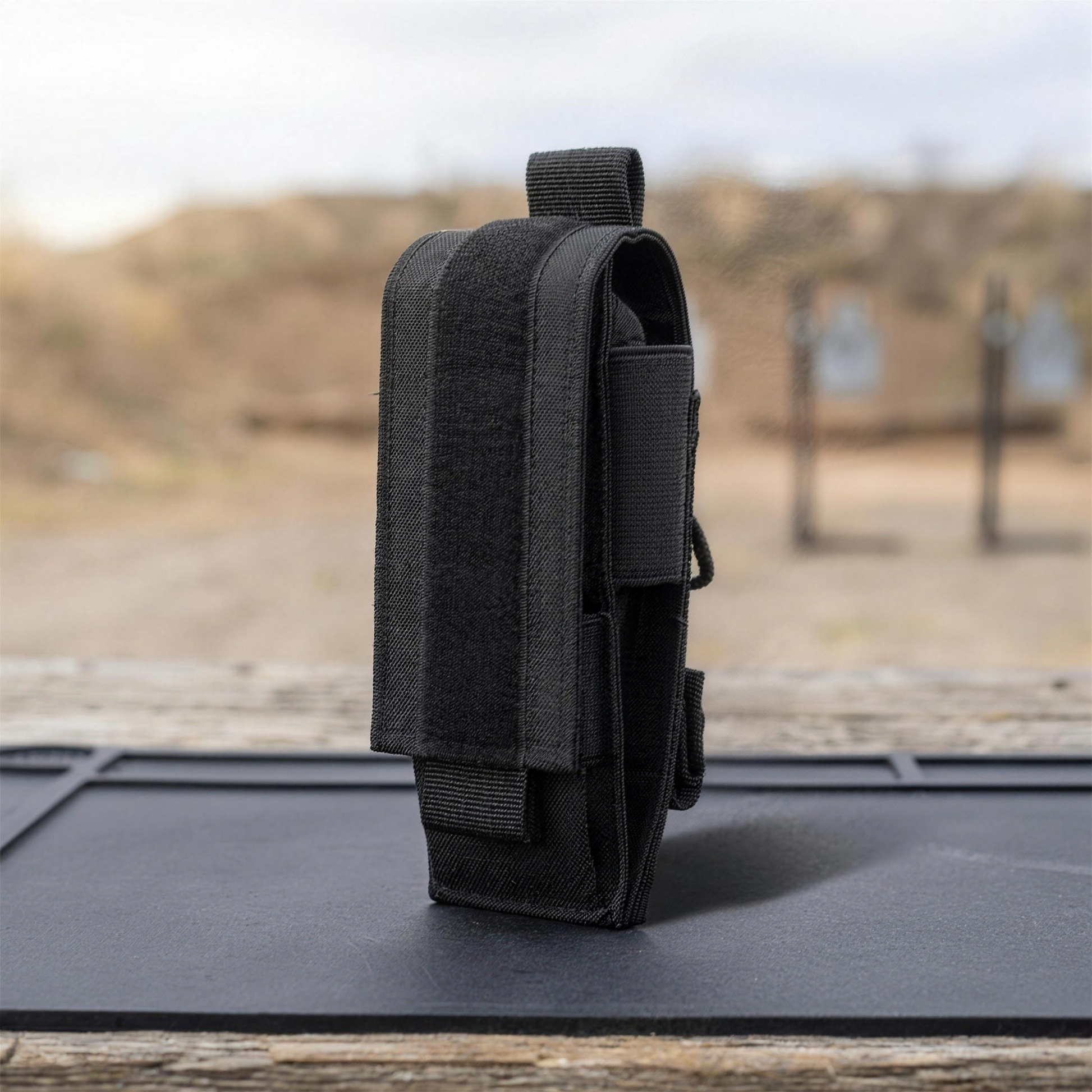 ICONTACTIC Single Magazine Pouch, concept render pending supplier verification, empty pouch on an outdoor range bench