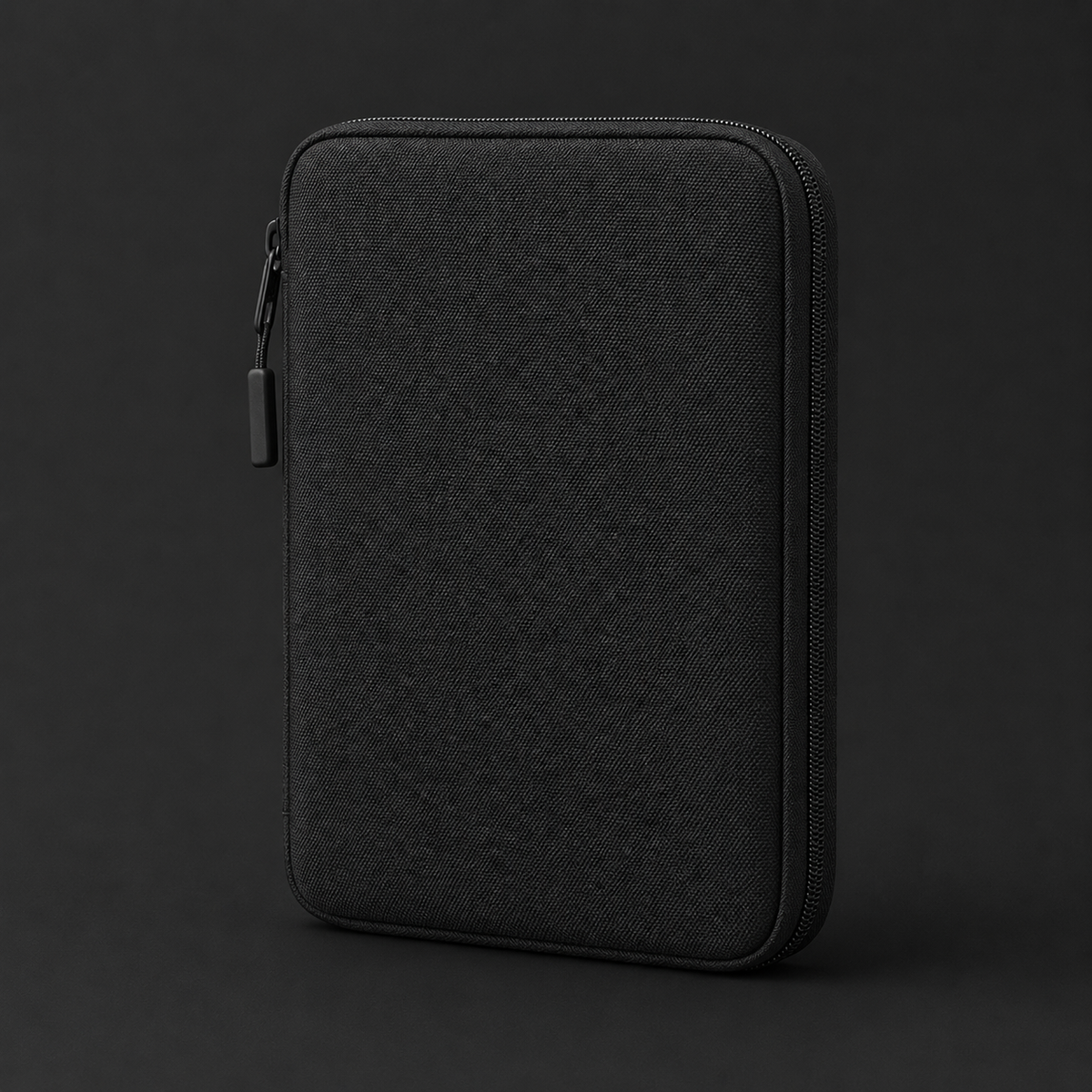 ICONTACTIC Compact Zip Organizer, concept render pending supplier verification, closed, on graphite