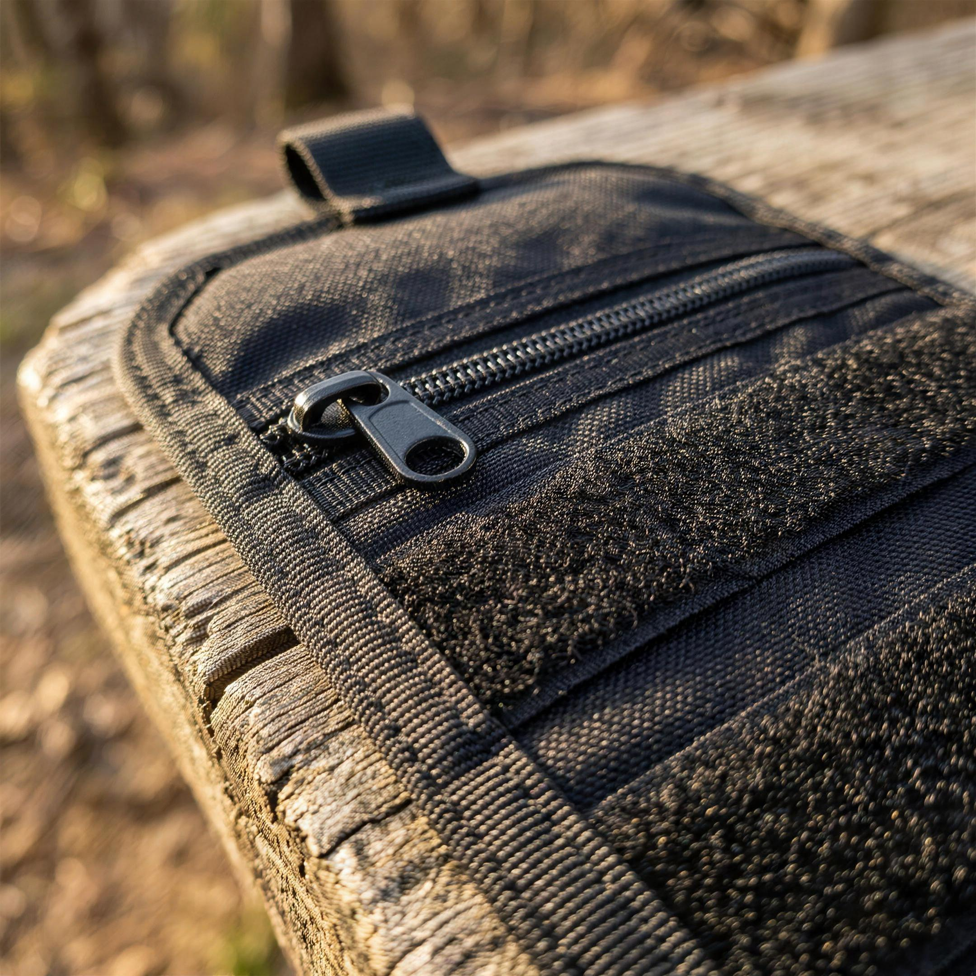 ICONTACTIC Compact Zip Organizer, concept render pending supplier verification, close-up of the zipper and MOLLE webbing