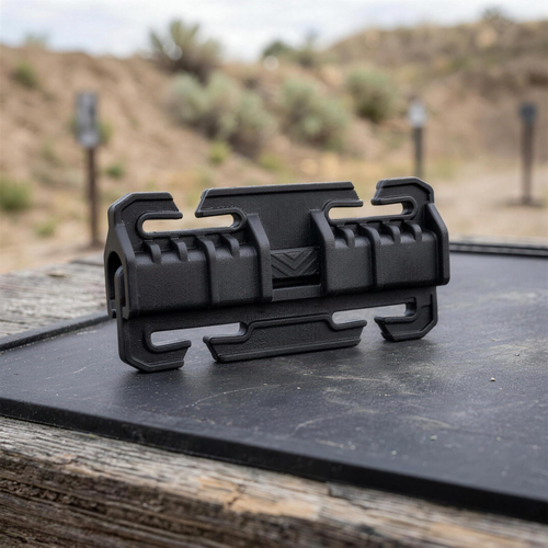 ICONTACTIC 25mm Quick-Connect Buckle, concept render pending supplier verification, buckle only on an outdoor range bench
