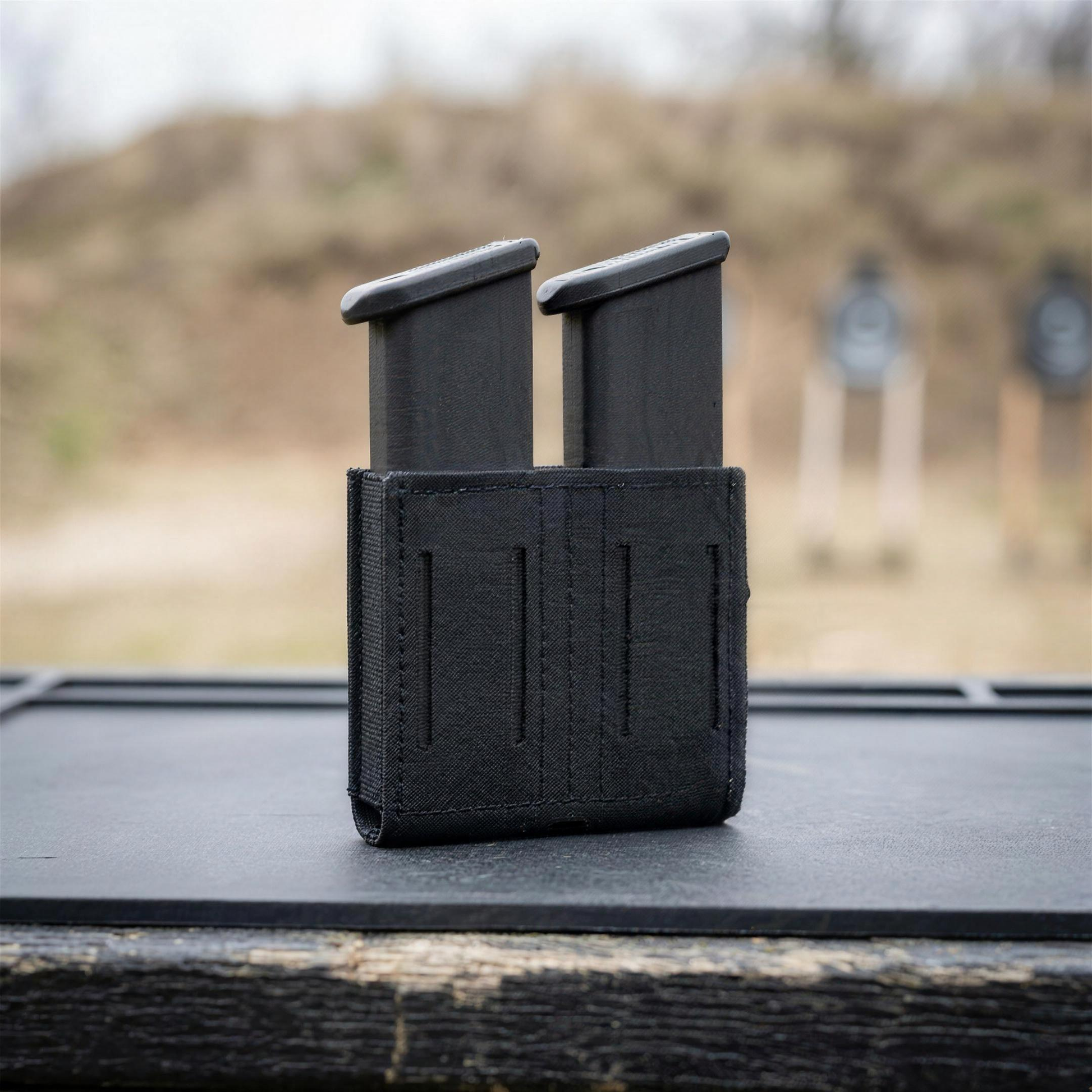 ICONTACTIC Low-Profile Double Magazine Pouch, concept render pending supplier verification, pouch with two magazines on an outdoor range bench