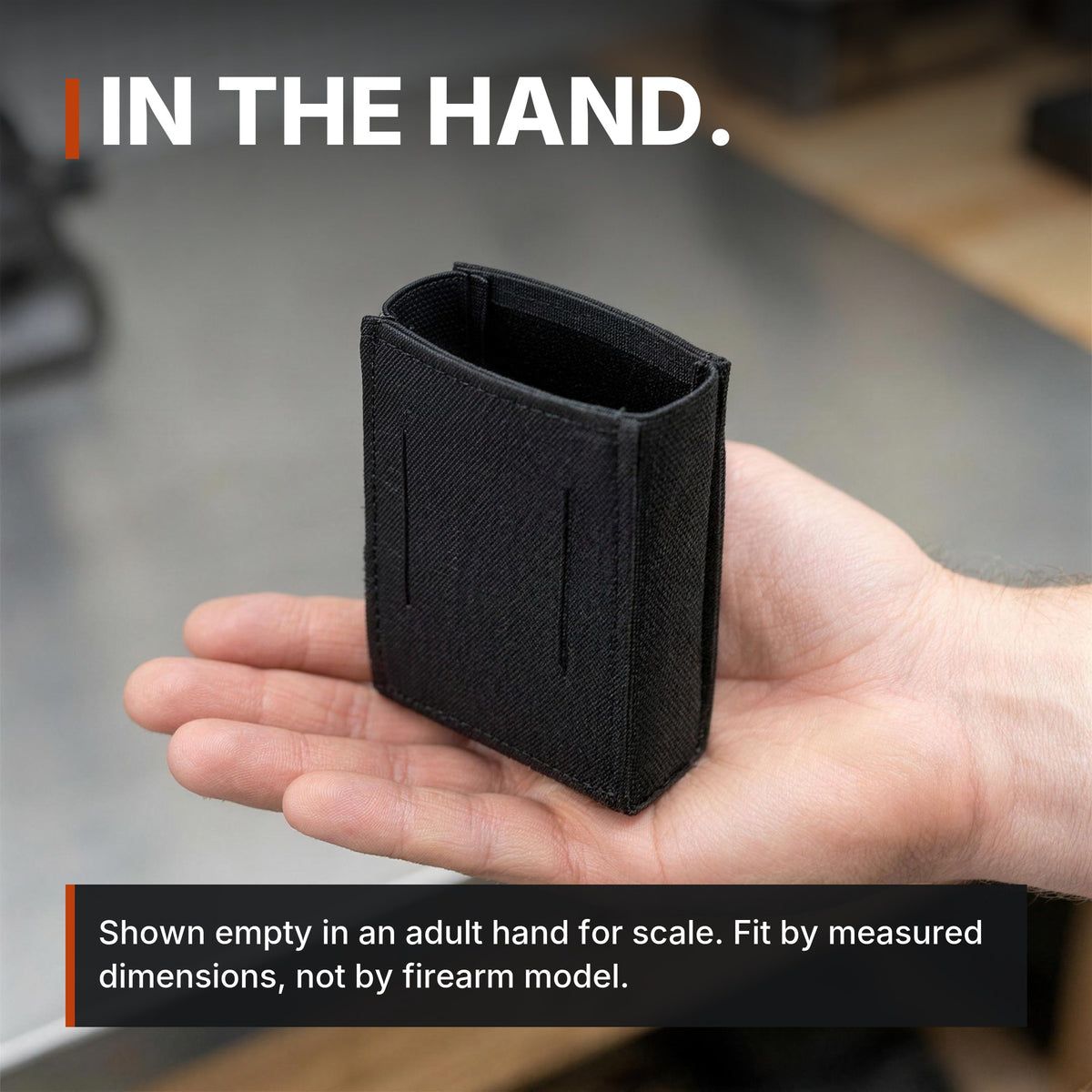 ICONTACTIC Low-Profile Rifle Magazine Pouch infographic: In the hand, shown empty for scale