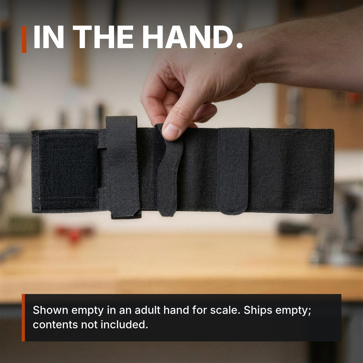 Ankle Utility Carrier infographic: In the hand, shown empty for scale