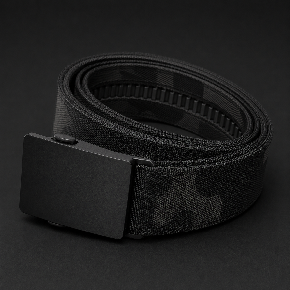 ICONTACTIC 1.5-Inch Nylon Ratchet Belt, concept render pending supplier verification, buckle and inner track close-up on graphite