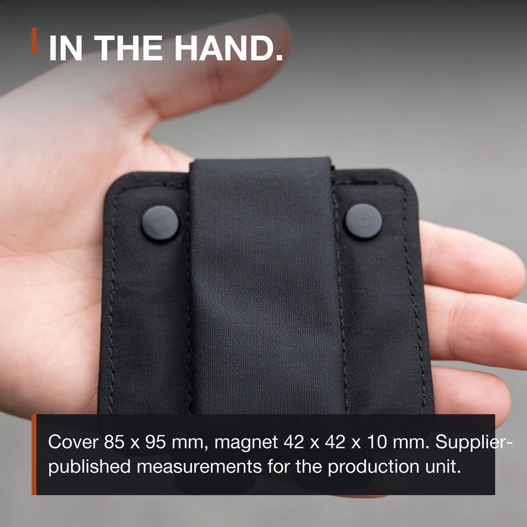 ICONTACTIC Magnetic Retention Catch held in an adult hand for scale: cover 85 x 95 mm, magnet 42 x 42 x 10 mm