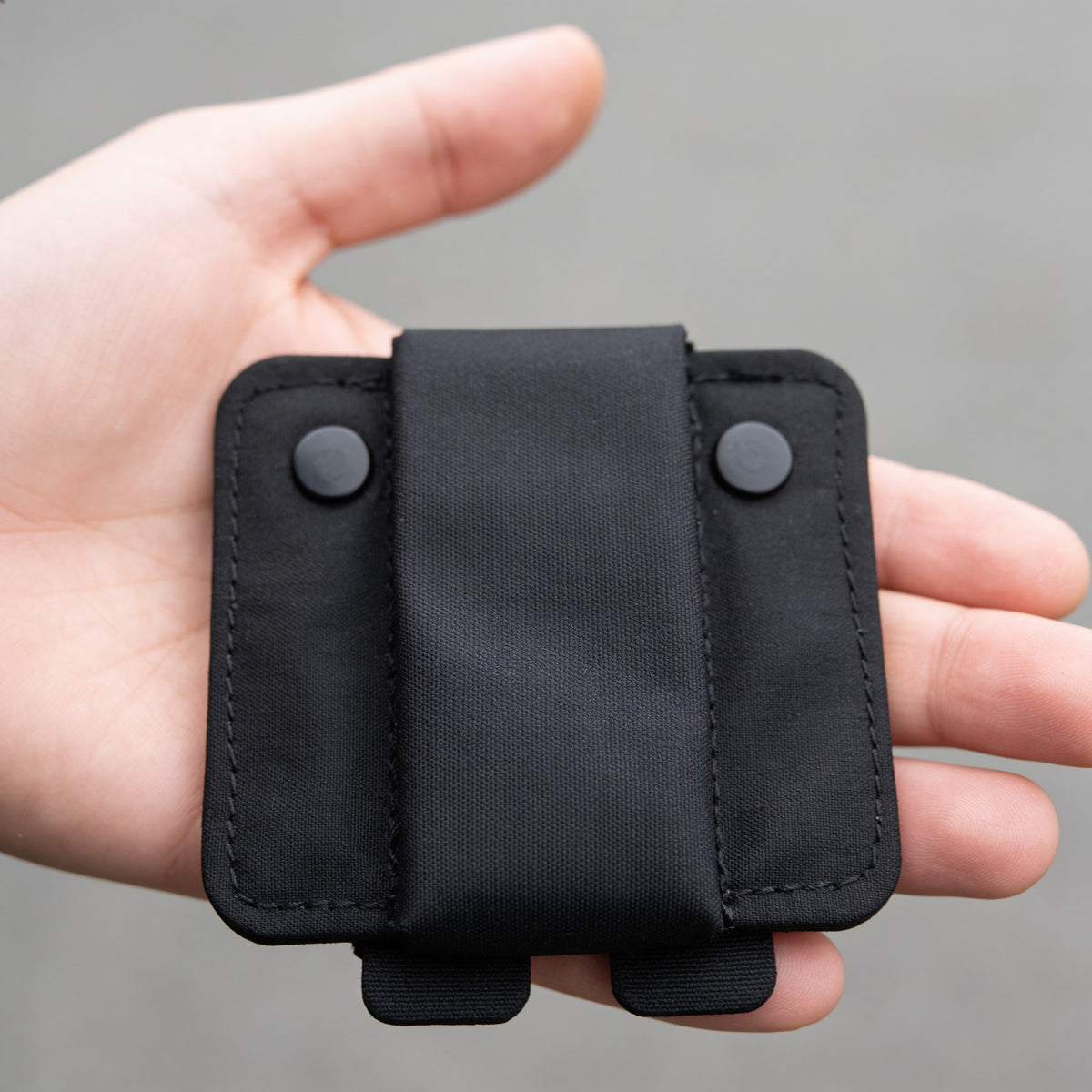 Palm sized. Black only.