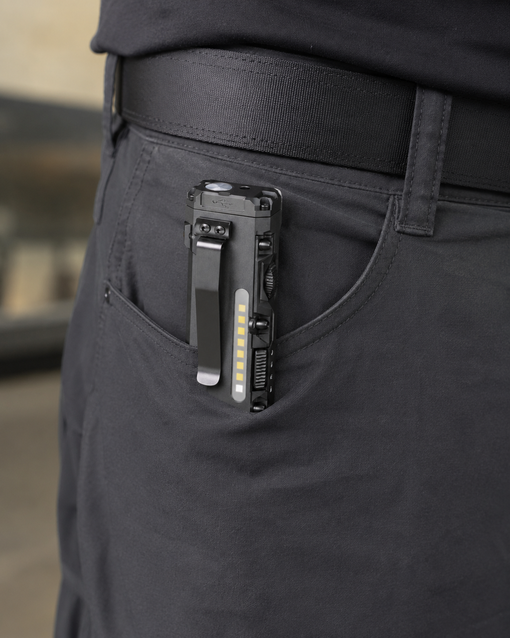 ICONTACTIC Compact Flat Flashlight, concept render pending supplier verification, clipped inside a trouser pocket, switched off, illustrative